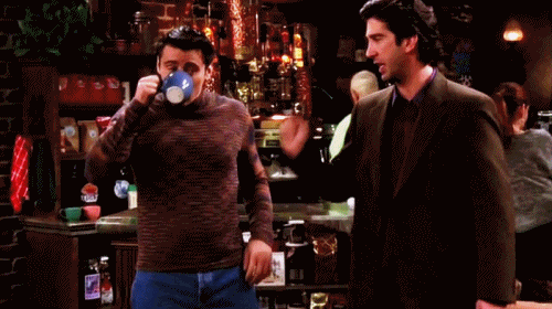 joey pushes ross in a bar gif